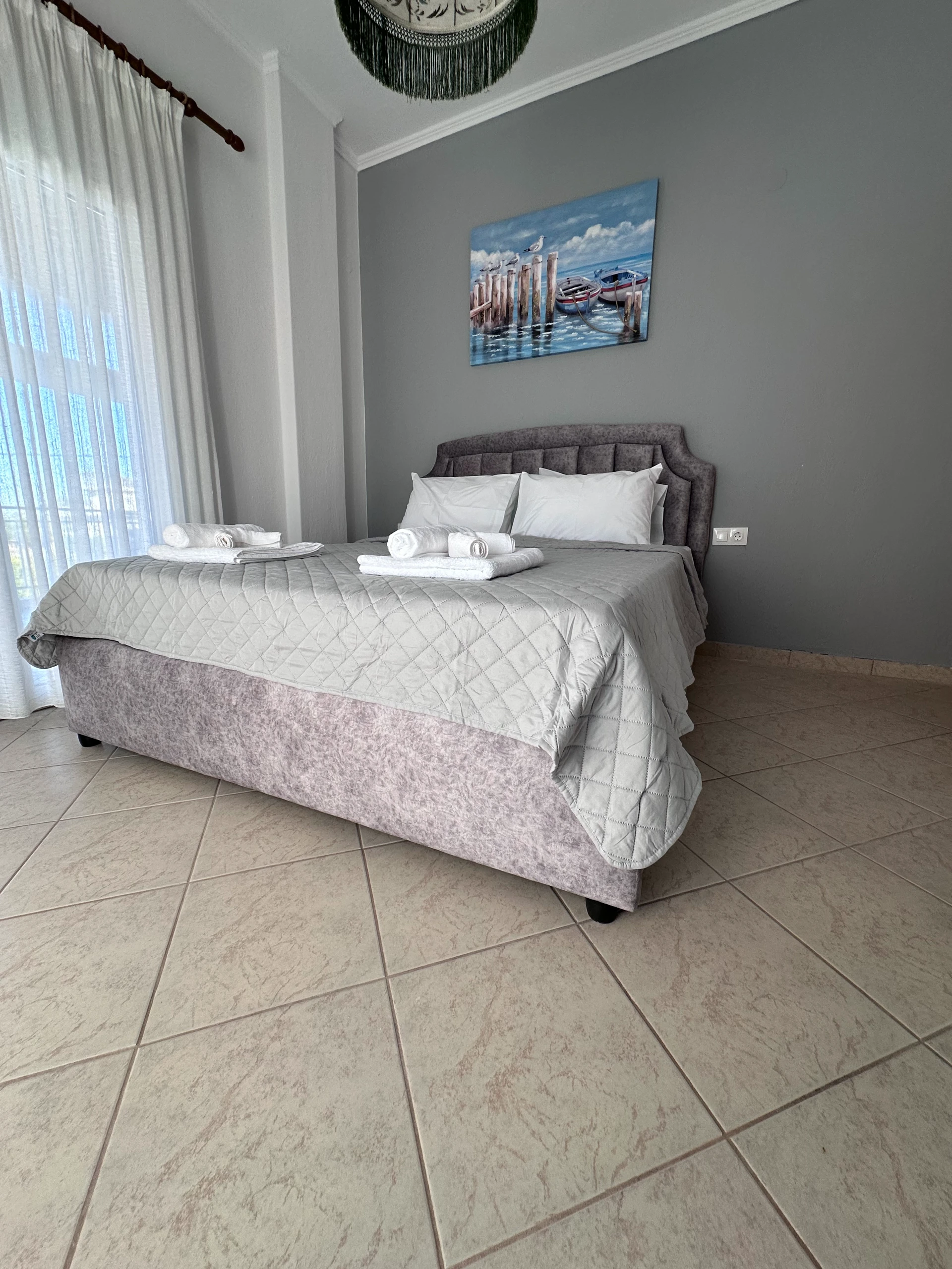 Double bed in K Aparts apartment Makrygialos Pieria