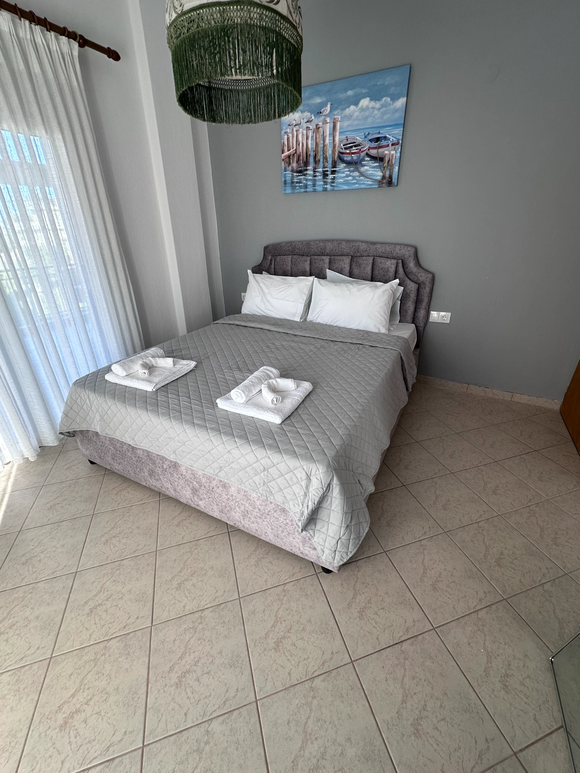 Comfortable sleeping area in Makrygialos Pieria apartment